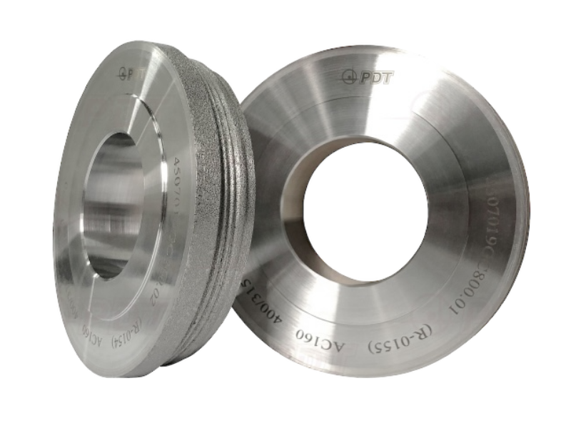 Diamond dressing rollers for the production of precision aircraft parts
